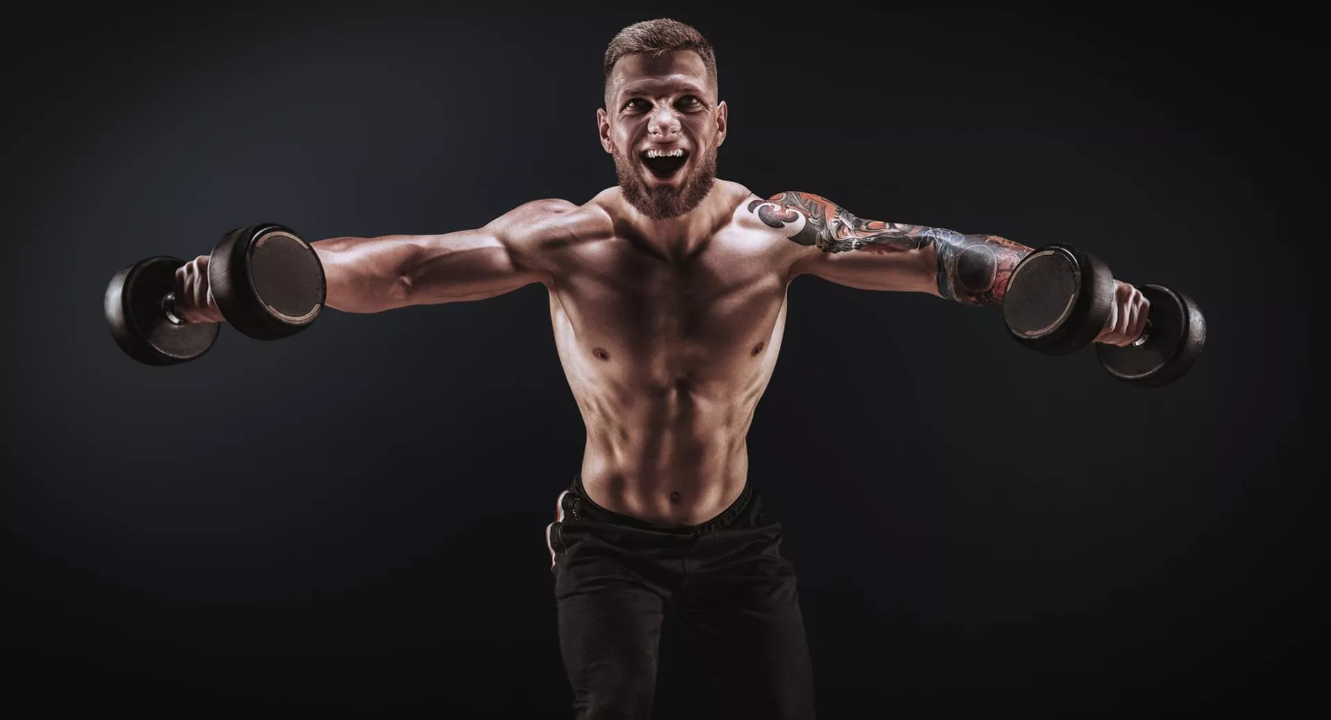 Фото к статье: Разведение гантелей в стороны: техника выполнения и лучшие варианты (видео)